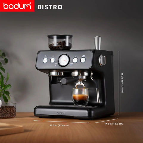Premium Game Changer Electric Espresso Machine With Integrated Stainless Steel Burr Grinder And High Pressure Milk Frother Steam Wand For Straight Up Barista Style Brewing At Home In Classic Black, side view showing grinder and espresso.
