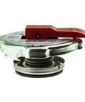 Safety Lever Radiator Cap ST18 For Jeep Wrangler And Grand Cherokee Fits Patriot Compass Liberty Commander TJ And JK Models Grand Wagoneer 93 21 And Pontiac Firebird 93 02 Dodge Chrysler Compatible Radiator Cap Replacement Ride Ready, side view with red lever