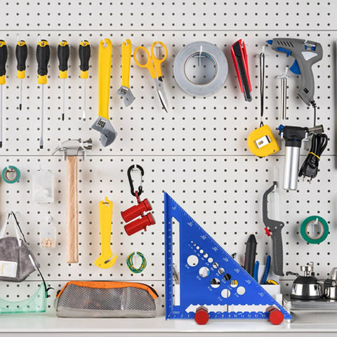 Tall Pro Grade Stair Gauges For Framing Square With Holder And Hook Framing Jig for Speed Square on a workshop pegboard