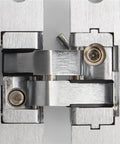 Close-up of 2 Pack 180 Degree Concealed Cross Door Hinges Zinc Alloy Invisible Hinge For Gate Door Cupboard Furniture Hardware