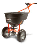 Big Yard Workhorse 130 Lb Walk Behind Lawn And Garden Broadcast Spreader with pneumatic tires in orange and black