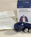 Mucus Clearing Lung Exerciser With Flutter Valve And Expiratory Trainer, device with box and instructions on countertop