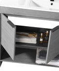 Slick 48 Inch Bathroom Vanity With Built In Sink And Modern Silhouettes Featuring Buttery Smooth Soft Close Doors Spacious Storage Drawers And A Rock Hard Finish Designed For Tiny Baths Requiring Full Assembly, showing open soft-close cabinet with towels and storage.