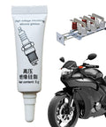 White tube of 5g Dielectric Lubricant For Electronics And Automotive Weatherproof Silicone Grease with motorcycle and electrical components