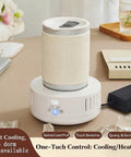 Dual Zone Cup Cooler And Warmer Keeps Your Drinks Totally Chilling Or Scorching Hot Year Round Electric Desk Beverage Station Perfect For Coffee Or Soda With Us Plug placed on desk with a can.