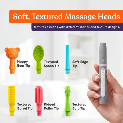 Calming Oral Motor Stimulation Kit with six soft textured heads, gentle vibrations, and interchangeable wands visible on table.