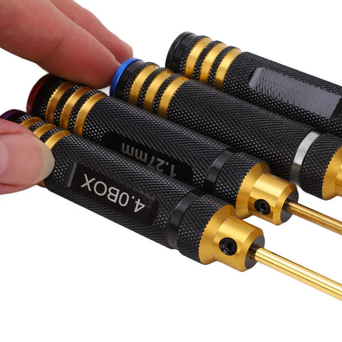 Close-up of Hex Screwdriver And Socket Repair Tool Kit For Remote Control Cars Boats And Aircraft with black gold handle