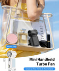 Portable Handheld Fan With Semiconducting Cooling in a clear bag with makeup items, showcasing its compact size.
