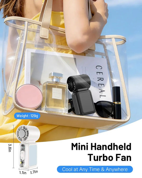 Portable Handheld Fan With Semiconducting Cooling in a clear bag with makeup items, showcasing its compact size.