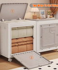 Heavy Duty Foldable Storage Bin With Lid Gray Extra Large 120L Capacity Wheels Smooth Glide For Closet Bedroom Living Room with blankets inside.