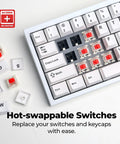 Compact 60 Percent White Mechanical Keyboard With Snappy Gateron Red Switches And Hot Swap Slots showing hot-swappable switches.