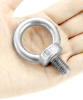 Top Shelf 304 Stainless Steel M12 x 20mm Shoulder Lifting Ring Eye Bolt With Male Thread on a hand for rigging tasks.