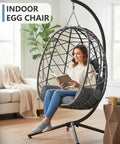 Outdoor Hanging Egg Chair With Stand Wicker Rattan Swing Chair With Cushioned Comfort in indoor setting
