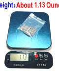 One Eighth Inch Dowel Pins Set, 20 Pieces, one inch long metal shelf pins in bag on scale showing weight of 1.13 ounces