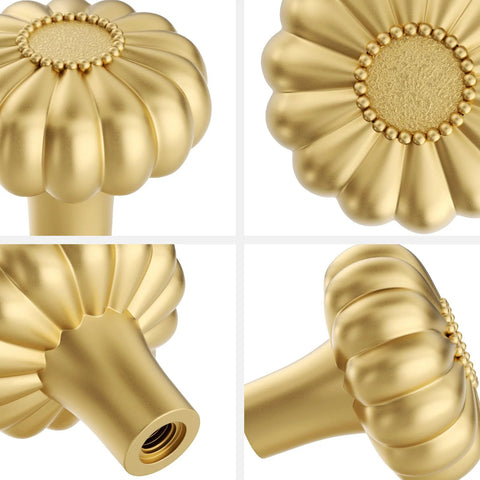 Close-up of 8 Pack Gold Brushed Brass Cabinet Knobs and Drawer Pulls, decorative solid zinc alloy, floral pumpkin shape.