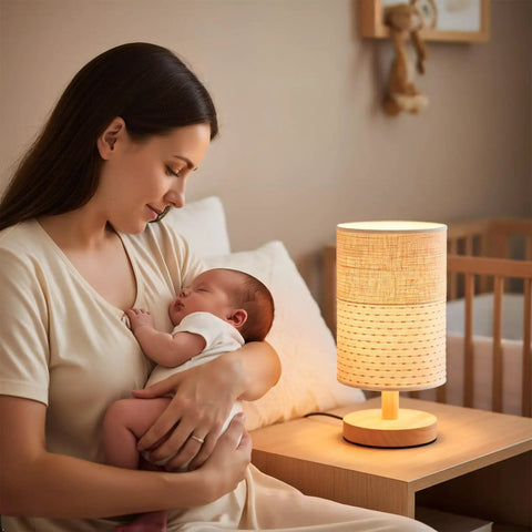 Table Desk Lamp With Brown Knit Fabric Shade Solid Wood Base Boho Nightstand Lamp For Bedroom Living Room End Table Or Office Warm White 3W LED Bulb Included On Off Switch Soft Cozy Light next to mother holding sleeping baby