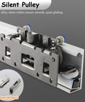 Close-up of zinc alloy silent pulley for Straight Up Sleek Hidden Track Sliding Door Hardware Kit For Adjustable Closets And Rooms Delivering Dead Silent Closure Soft Close Mechanism.