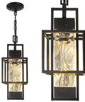 Top Tier 15 Inch Outdoor Indoor Pendant Light Featuring Heavy Duty Black Metal And Thick Water Seeded Glass, suitable for foyer.