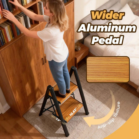 Slick Lightweight Aluminum Folding Step Ladder With Wide Pedals And Anti Slip Design 2 Step Stool, woman reaching bookshelf