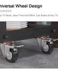 Close-up of the universal wheel design of the Three Tier Industrial Rolling Bar Cart With Thick Oak Shelves And Silent Casters For Living Room Hosting Hella Smooth Mobile Serving Trolley Top Shelf Storage Rack.