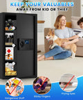 Open black 5.2 Cu Ft Large Fireproof And Waterproof Safe With LCD Keypad Anti Theft Alerts Hidden Code Mode Personal Combination Safe displaying organized valuables in a living room.