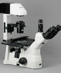 Inverted Trinocular Microscope With Long Working Distance And 40x-600x Magnification, WH10x Super Widefield Eyepieces Brightfield And Phase Contrast Objectives 30W Halogen Illumination, 0.3/0.5 NA Kohler Condenser, Mechanical Stage, 90-240V, side view