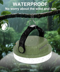 Rechargeable Camping Light Lantern with Six Modes and Three Color Temps hanging on a branch in rain, Army Green