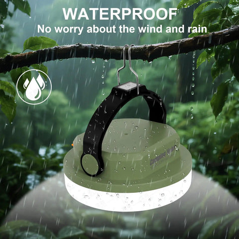 Rechargeable Camping Light Lantern with Six Modes and Three Color Temps hanging on a branch in rain, Army Green