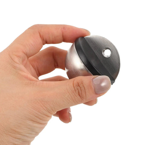 Hand holding Stainless Steel Floor Door Stopper 2 Pack Hemispherical Anti Collision Door Stop for Safety No Drill Install