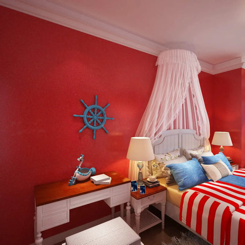Red Glossy Peel And Stick Wallpaper Vinyl Wrap With Glitter Finish in bedroom, decor with nautical theme, blue life preserver on wall.