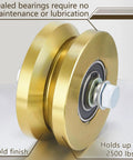 Solid 4 Inch V Groove Gate Wheel Set Heavy Duty Sliding Gate Rollers One And Three Quarters Inches Width Caster Wheels With 2500 Lbs Capacity Screw Mount Double Bearing Pair Two Sets, gold finish, side view.