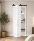 Top Shelf Two Panel Bifold Barn Door In Crisp White Primer Coating Measuring 36 By 84 Inches installed in a modern interior.