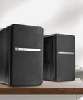 Booming 60W RMS Active Bluetooth Bookshelf Speakers With DSP And DRC, wood enclosure, on table, front view