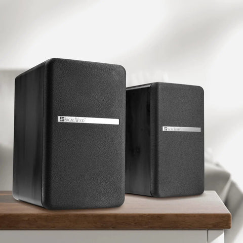 Booming 60W RMS Active Bluetooth Bookshelf Speakers With DSP And DRC, wood enclosure, on table, front view