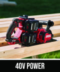 Heavy Duty Seven Quarter Inch Cordless Circular Saw Featuring Rear Handle And Brushless Motor Provides Killer Cuts Through Lumber Legit Forty Volt Dual Battery Kit With Two Five Amp Hour Cells And Quick Charge Station on a wooden surface.