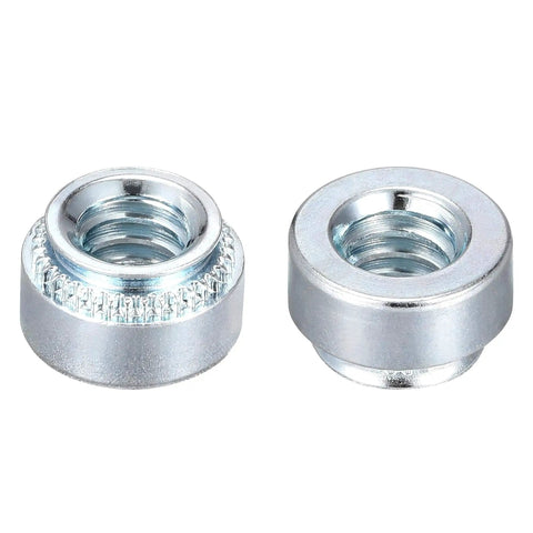Workhorse Self Clinching Rivet Nuts One Quarter Twenty By Point Two Two Inch Carbon Steel With Durable Zinc Plating Round Head, showing two nuts.