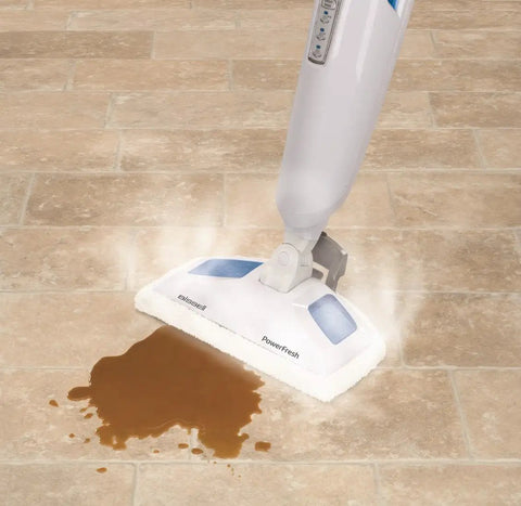 Genuine OEM PowerFresh Steam Mop cleaning spill with mop pad and fragrance disc on tile floor for Symphony All-In-One.