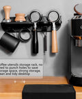 Heavy Duty Espresso Tamper Holder Wall Mount Portafilter Rack With Drip Tray Kitchen Coffee Accessories Organizer Barista Station mounted on wall with utensils.