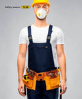 Construction worker wearing a yellow hard hat and safety mask with tools in an apron, indicating 'Safety means YELLOW'