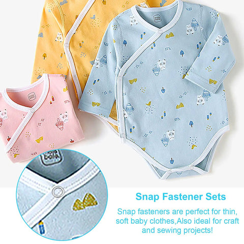 Three pastel baby bodysuits with snap fasteners in pink, yellow, and blue.