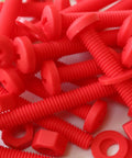 No Sweat 20 Piece Red Polypropylene Fastener Kit M6 X 60mm Phillips Pan Head Bolts With Nuts And Washers in a pile.