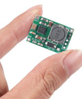 Person holding Six Pack TP5100 Battery Charger Module For Dual Lithium Cells 4.2V 8.4V 2A Charging Management Board 