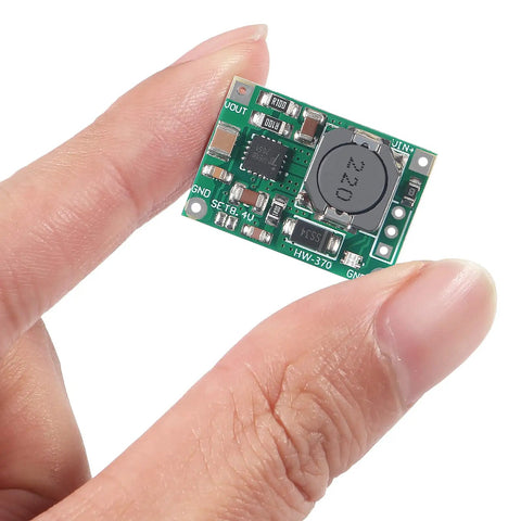 Person holding Six Pack TP5100 Battery Charger Module For Dual Lithium Cells 4.2V 8.4V 2A Charging Management Board 
