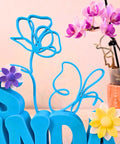 Custom 3D Printed Teacher Desk Name Plate Personalized Sign With Bold 3D Letters featuring floral accents and vibrant colors
