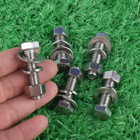 stainless steel hex bolt kit with nuts and washers on green background
