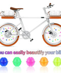 White bike with 216 Piece Multicolor Bike Wheel Spokes Beads Clip On Decorations for spokes and rims, colorful beads shown.