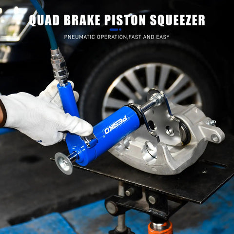 Quad Caliper Piston Compressor Tool Heavy Duty Pneumatic Brake Caliper Press in action with vehicle caliper on workbench
