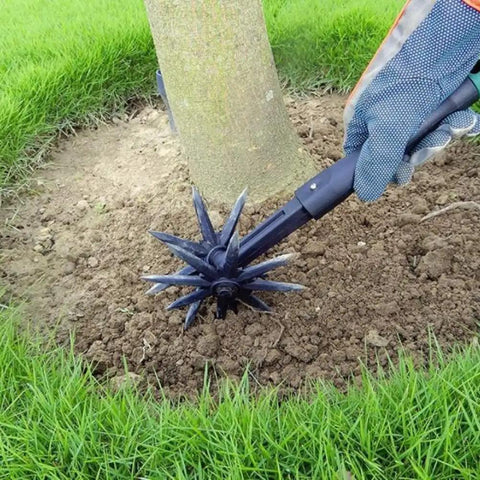 Cordless Cultivator For Lawn And Garden Adjustable Handheld Tiller For Soil Mixing Aeration in use by tree base