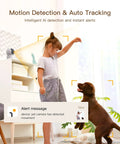 4MP Smart Pet Security Camera With Dual Band Wifi AI Motion Alerts detecting a girl playing with a dog indoors.