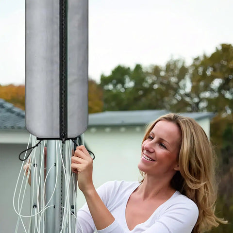 Person using Rotating Washing Line Cover With Waterproof Zip Closure For All Season Outdoor Use And Easy No Fuss One Handed Setup Protects Tumble Dryers